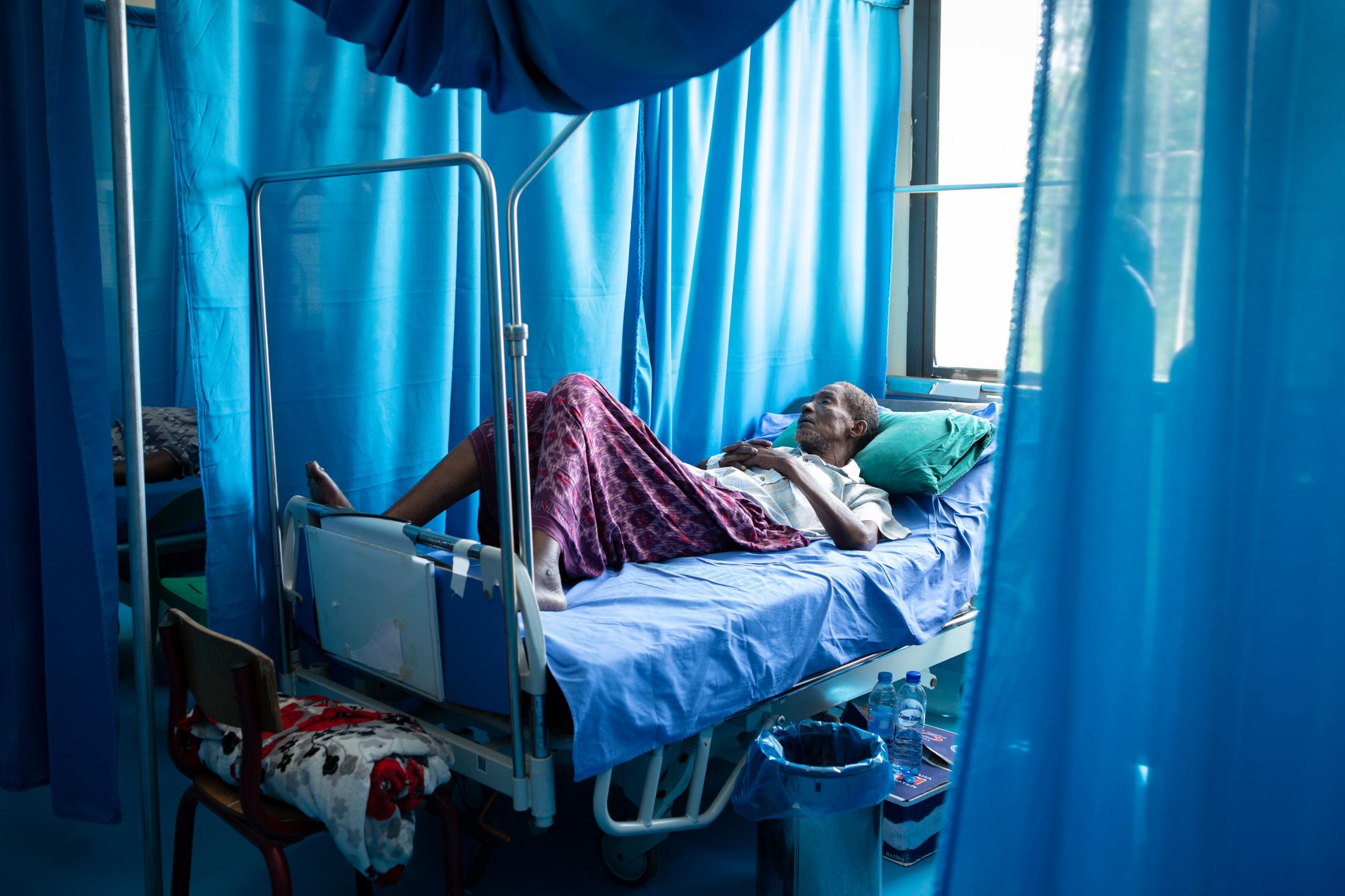 A day at a COVID -19 treatment centre in Somalia - An elderly man at the treatment ward recovering from...