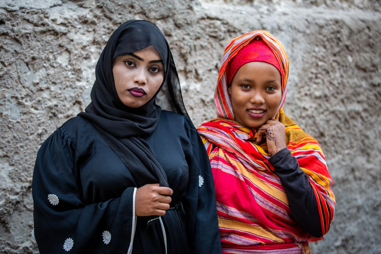 Narrow Alleys of Xamar Weyne - Naima (left) and Safia (right) pose for a photo in Xamar...