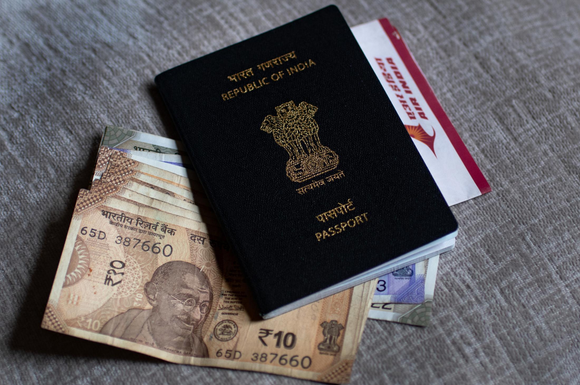  Passport, tickets, and my dreams all bundled in a suitcase, ready to start a new adventure. While unpacking, I found some Indian currency that sat unused&nbsp; in my backpack since the COVID-19 pandemic. Perhaps it was the change I received for the ice cream I had a long time ago. 