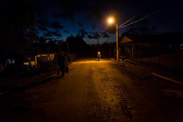 Image from LA ISLA - CUBAN DIARIES - People going back home. The main street is poorly...