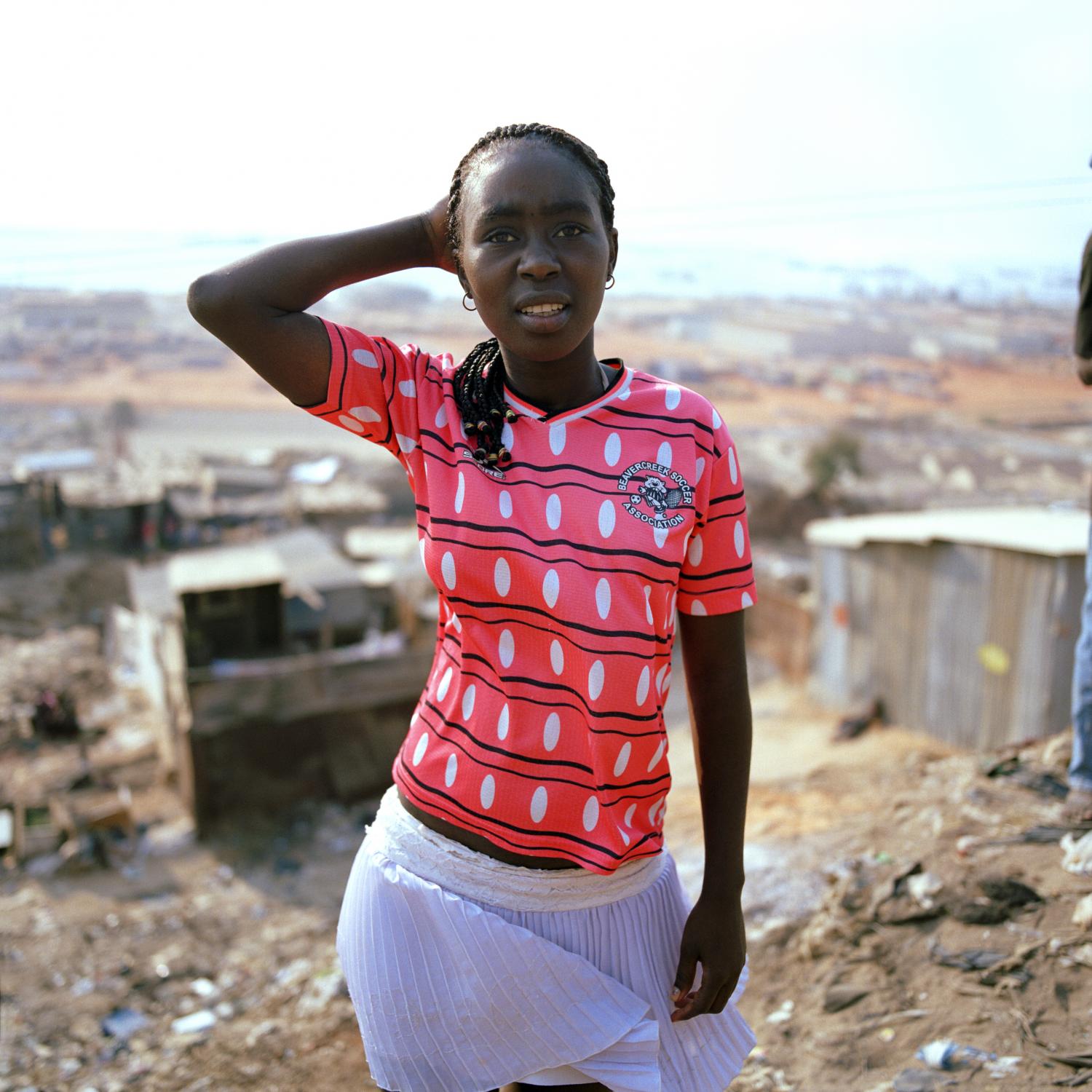 Angola - A resident of a shantytown built over a garbage dump in...