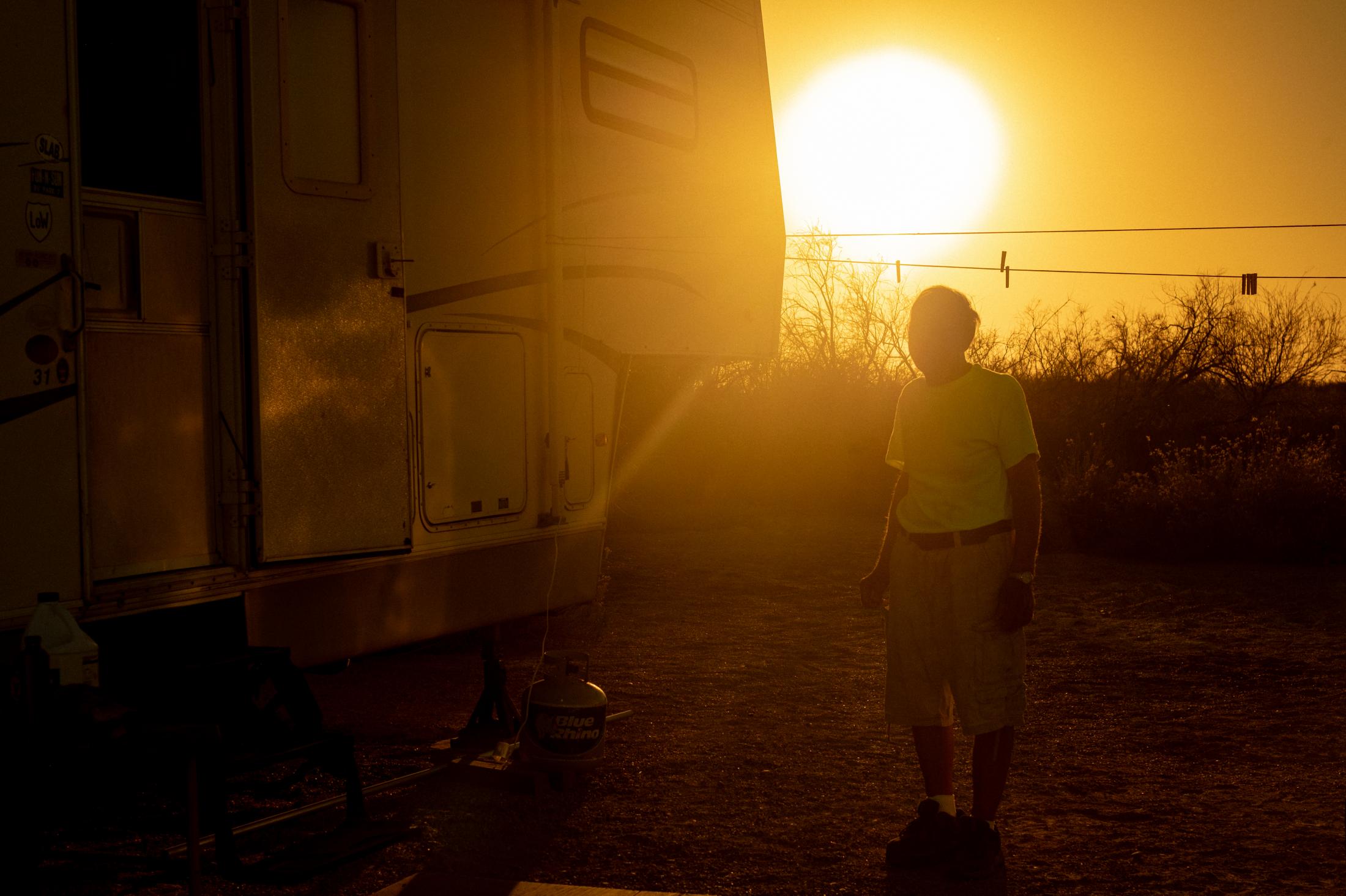 A Warm Winter (An Ongoing Journey) - Jim standing outside his van parked in the Hot Springs...