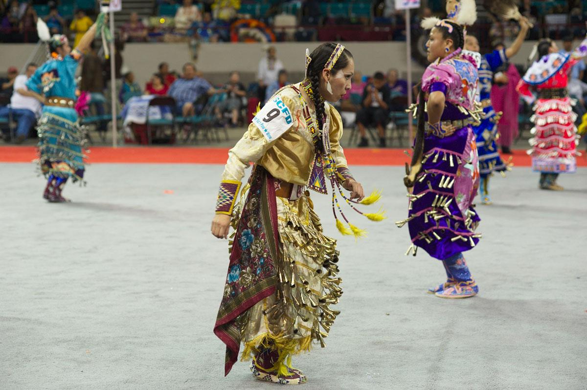 I Have a Tribe, They Are Only Americans - Adrianna (front) dances the Jingle Dress Dance. The...
