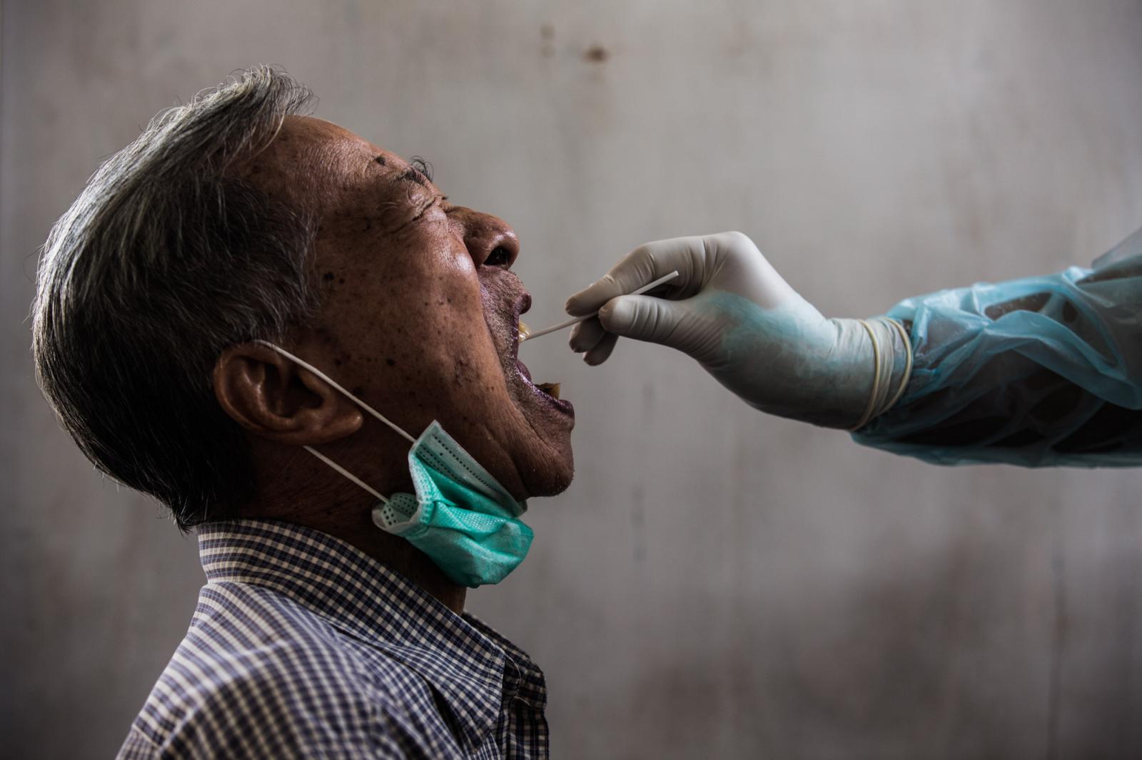 An elderly man is tested for Co..., Bangkok, Thailand, April 202.
