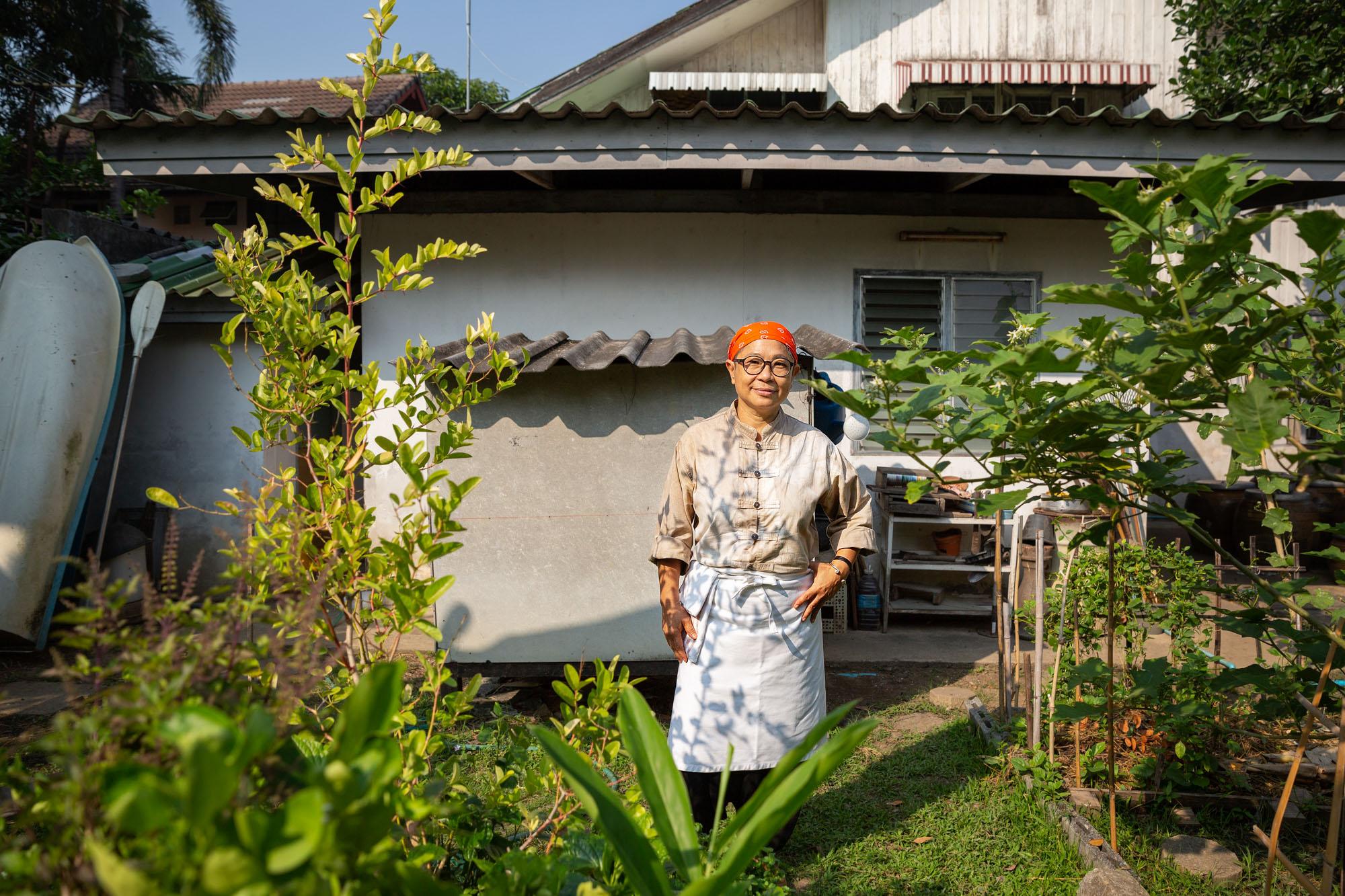 Step Into My (Home) Office: Rest Of World - Hnoi Latthitham, 53, stands for a portrait at her home in...