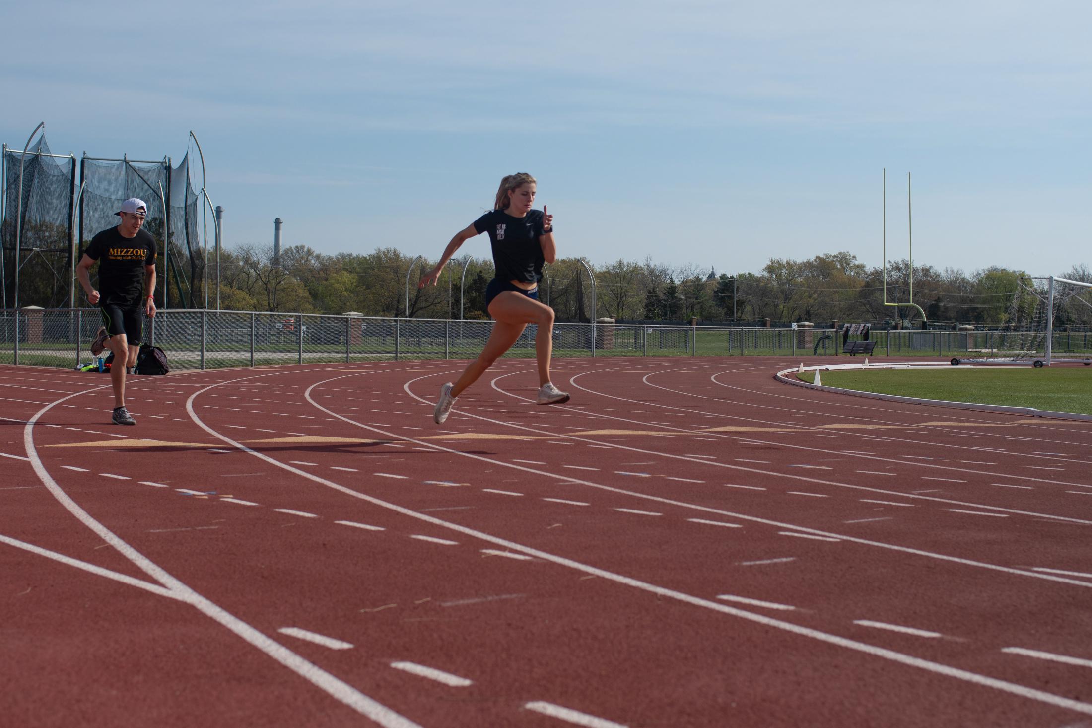 Pandemic Obstacles - Tess Losacker sprints during one of her training...