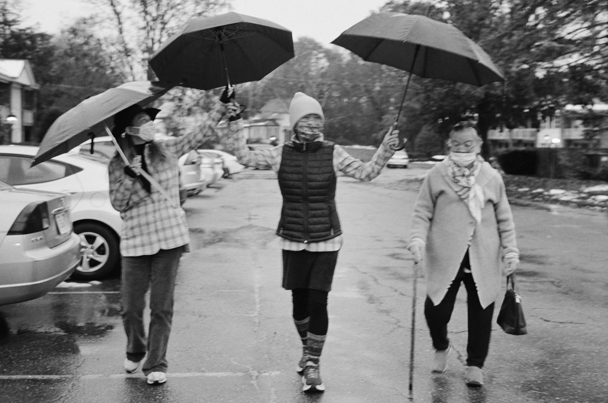 Katherine In Covid - Katherine walking with her mom and halmoni in the rain...