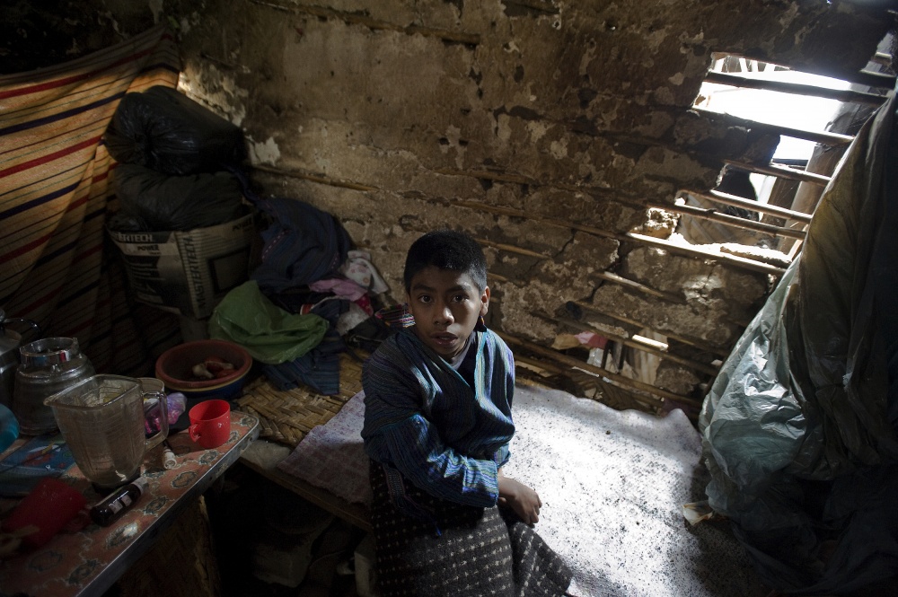  Josue, 13, sleeps in the corne...ently expecting her 5th child. 