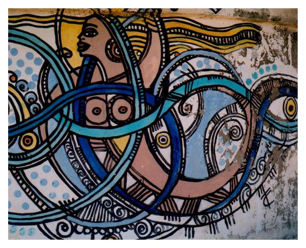 The roads of Yemoja -  This painted representation of Mamiwata lays on a ritual...