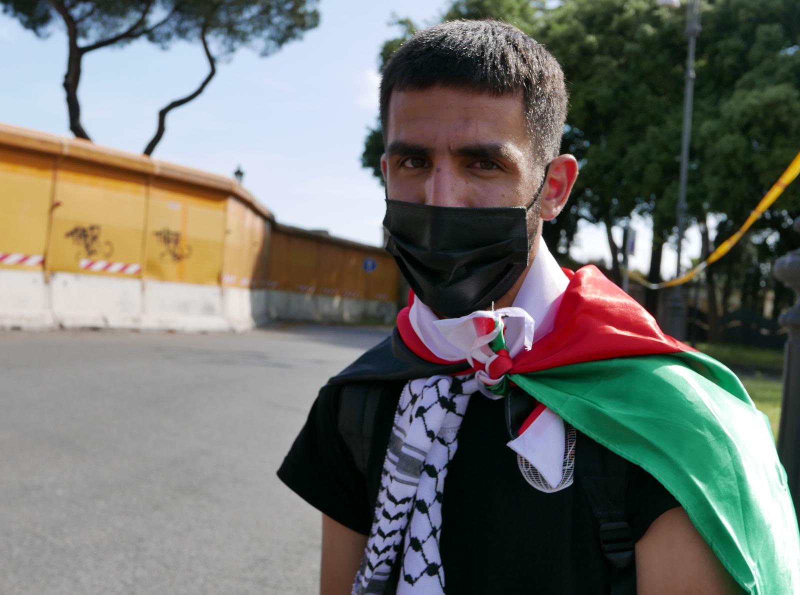 A Palestinian boy at pro Palestina demonstration, San Giovanni, Rome