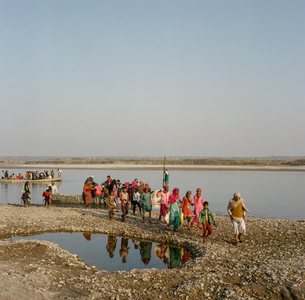 Around sunset each Thursday, people from the surrounding area of Rampur Raighati Aht, in the state of Uttarakhand, India, travel by boat across the Ganges River to bordering Uttar Pradesh to pray at a mosque.