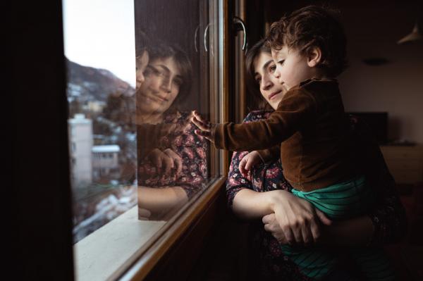 THE ALPINE ROUTE - A child with his mother, Iranian Kurds, arrived in France...