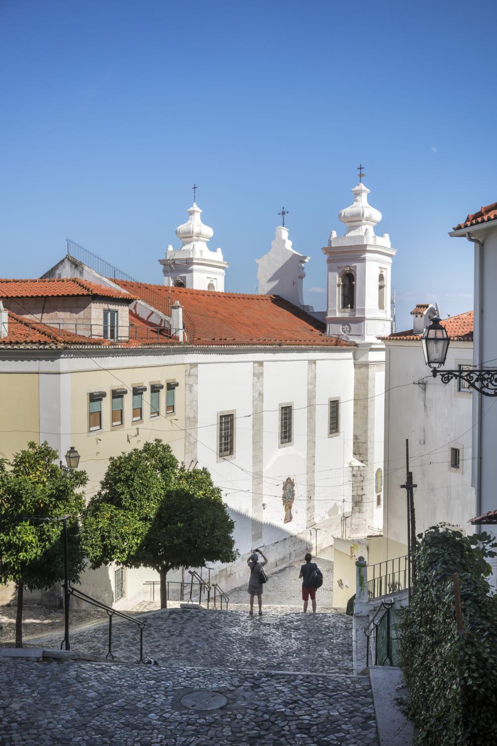 Lisbon - Tourists in Alfama, a historic working class neighborhood...