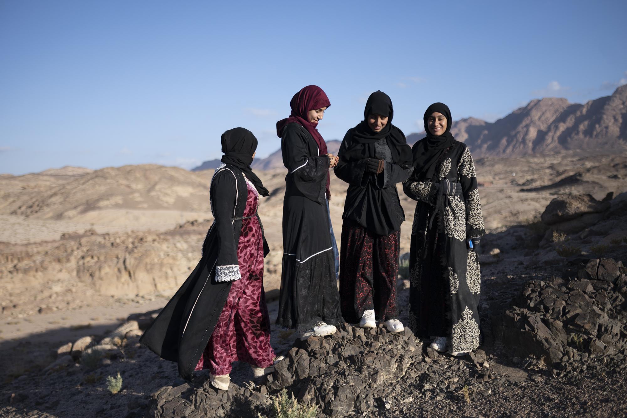 On National Geographic: In one of Egypt's most spiritual places, Bedouins find peace and resilience - From left, Nora Mohamed, Nadia Mohamed, Hoda Mohamed, and Mariam Ibrahim &nbsp;stand on a...
