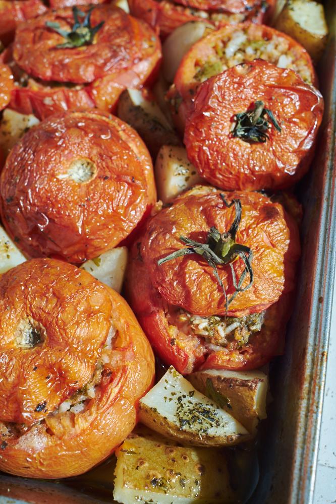 Yemista are baked tomatoes stuf...lling and served with potatoes.