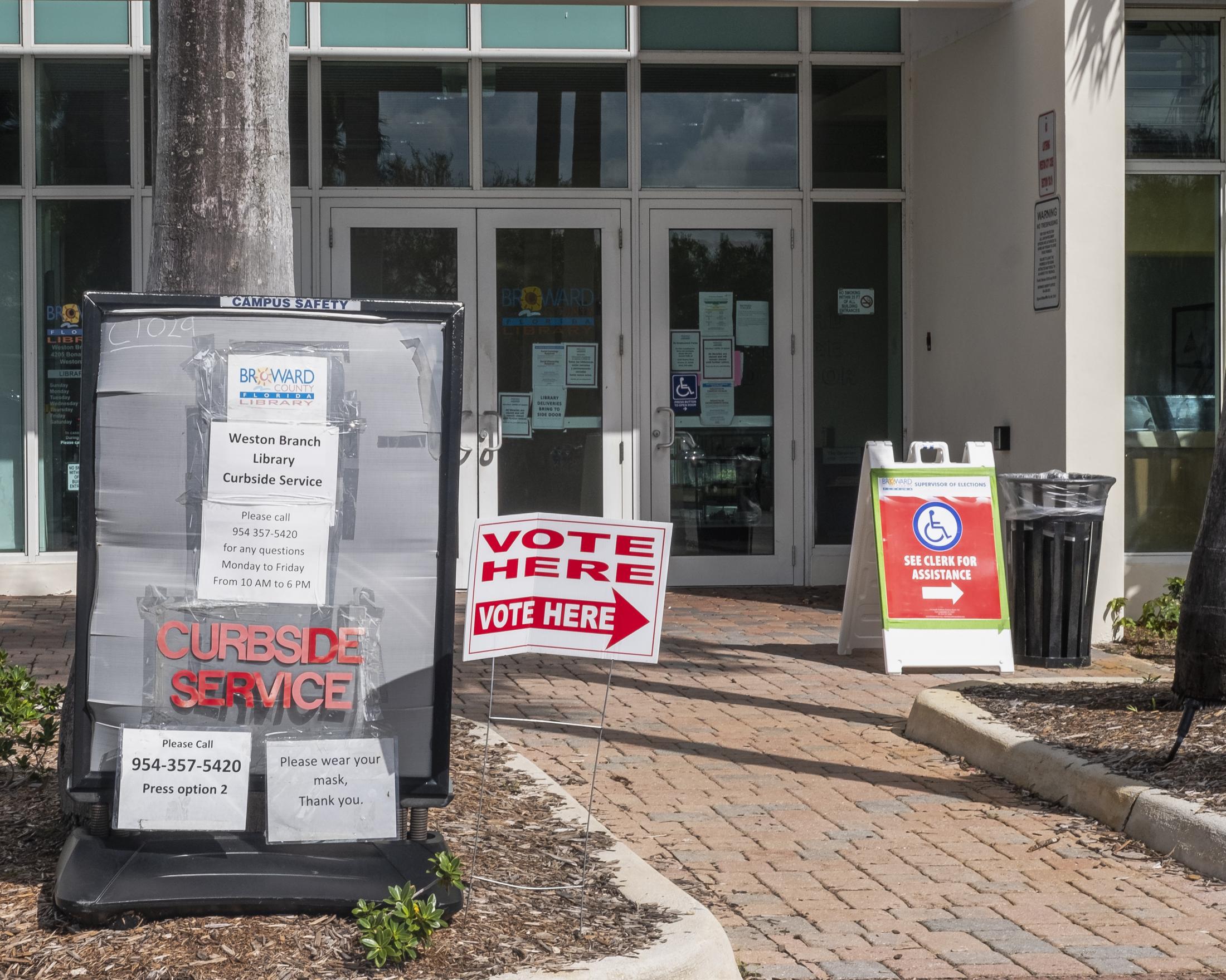 Weston, Fl. 2020 Election: Early Voters -  Signs at the Broward County Library Weston Branch - an...