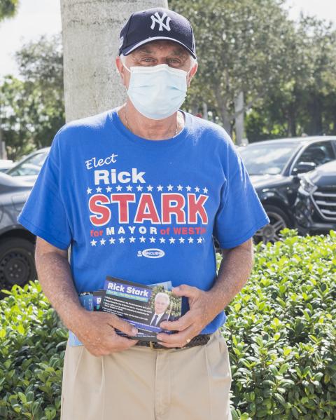 Weston, Fl &ndash; October 29, 2020: Rick Stark; Weston resident and candidate for Mayor of Weston wearing his New York Yankees hat and campaining outside of the Broward County Library Weston Branch - an early voting location. Credit: Andres Guerrero