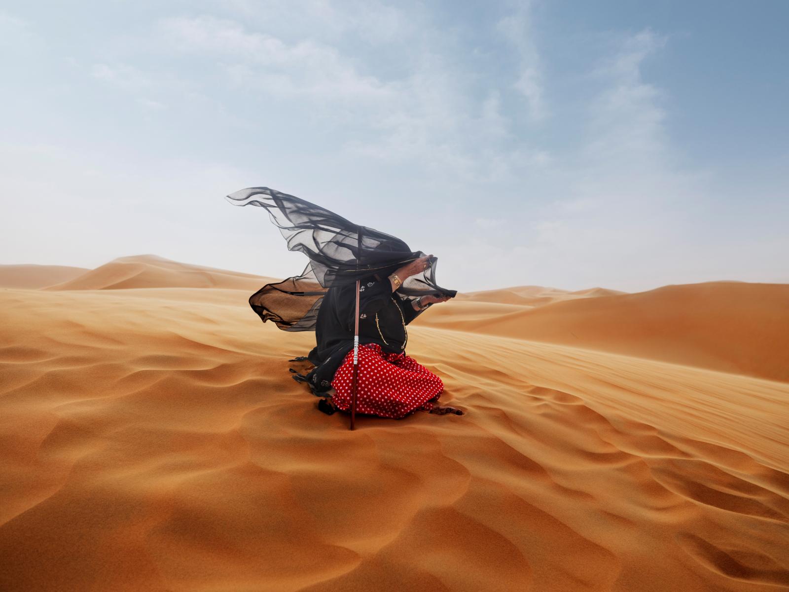 Fatima in a desert storm in Liwa, UAE