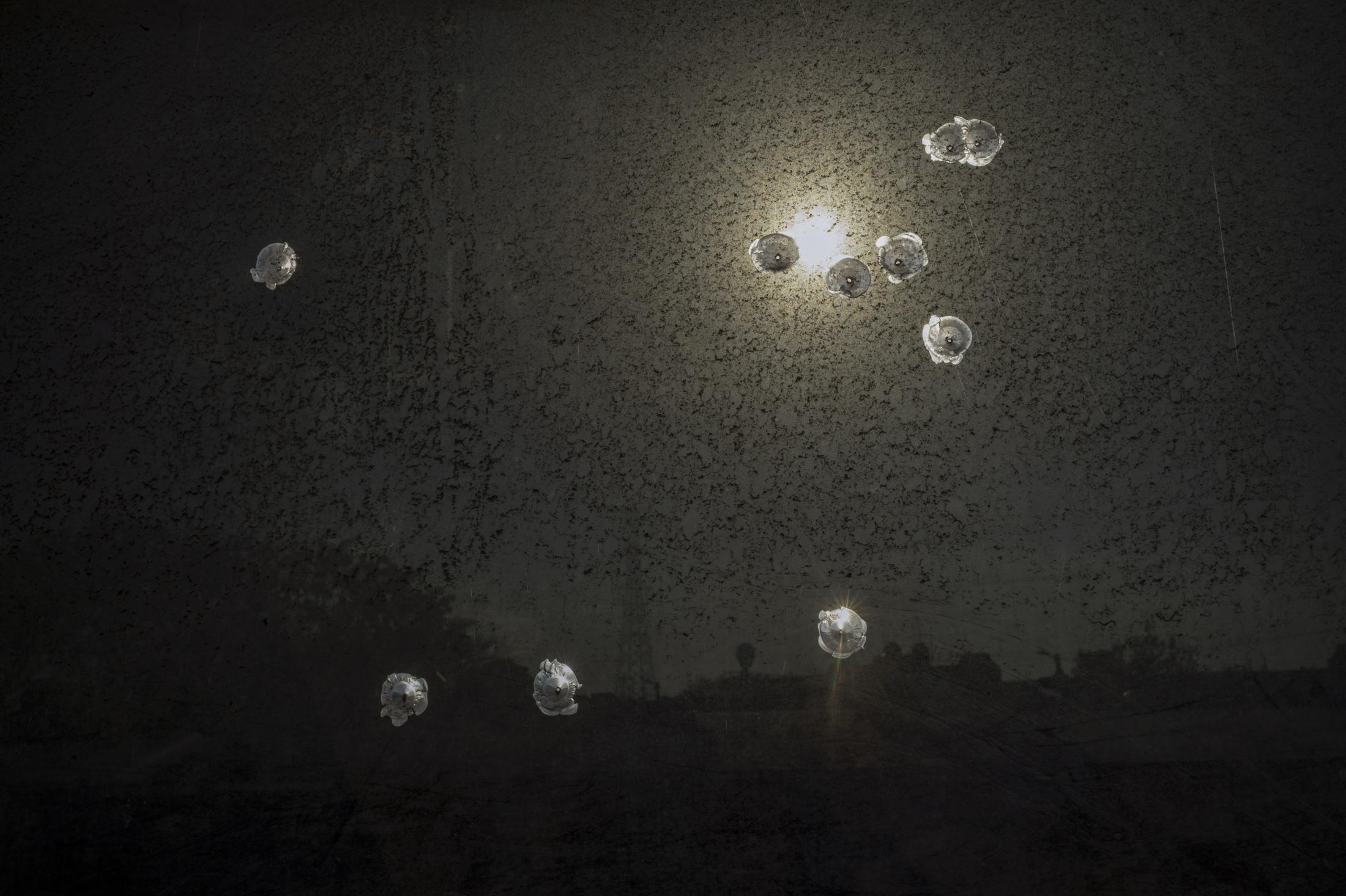 March 30, 2021, Veracruz, Mexico. Detail of a window of Ana&#39;s house, which has bullet impacts, which were made months later the kidnapping of her mother.