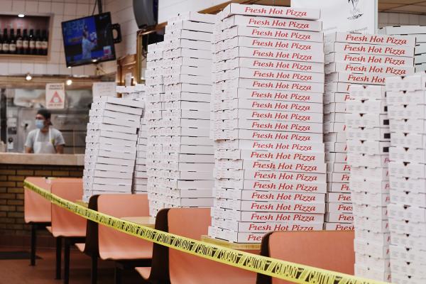 "New York is Back"? - Pizza boxes at pizzeria working take out only. March 2020, Brooklyn.