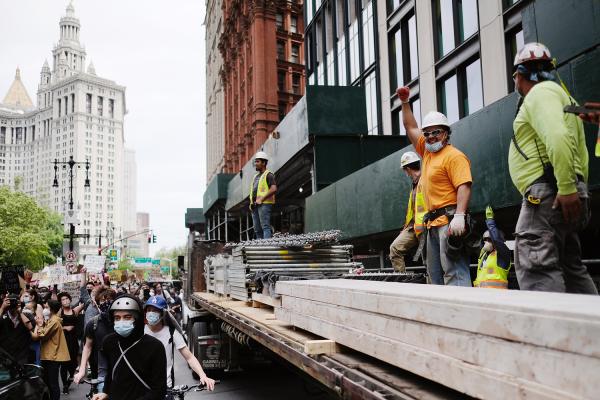 "New York is Back"? - Construction workers showing support to protests during the George Floyd protests. June 2020,...