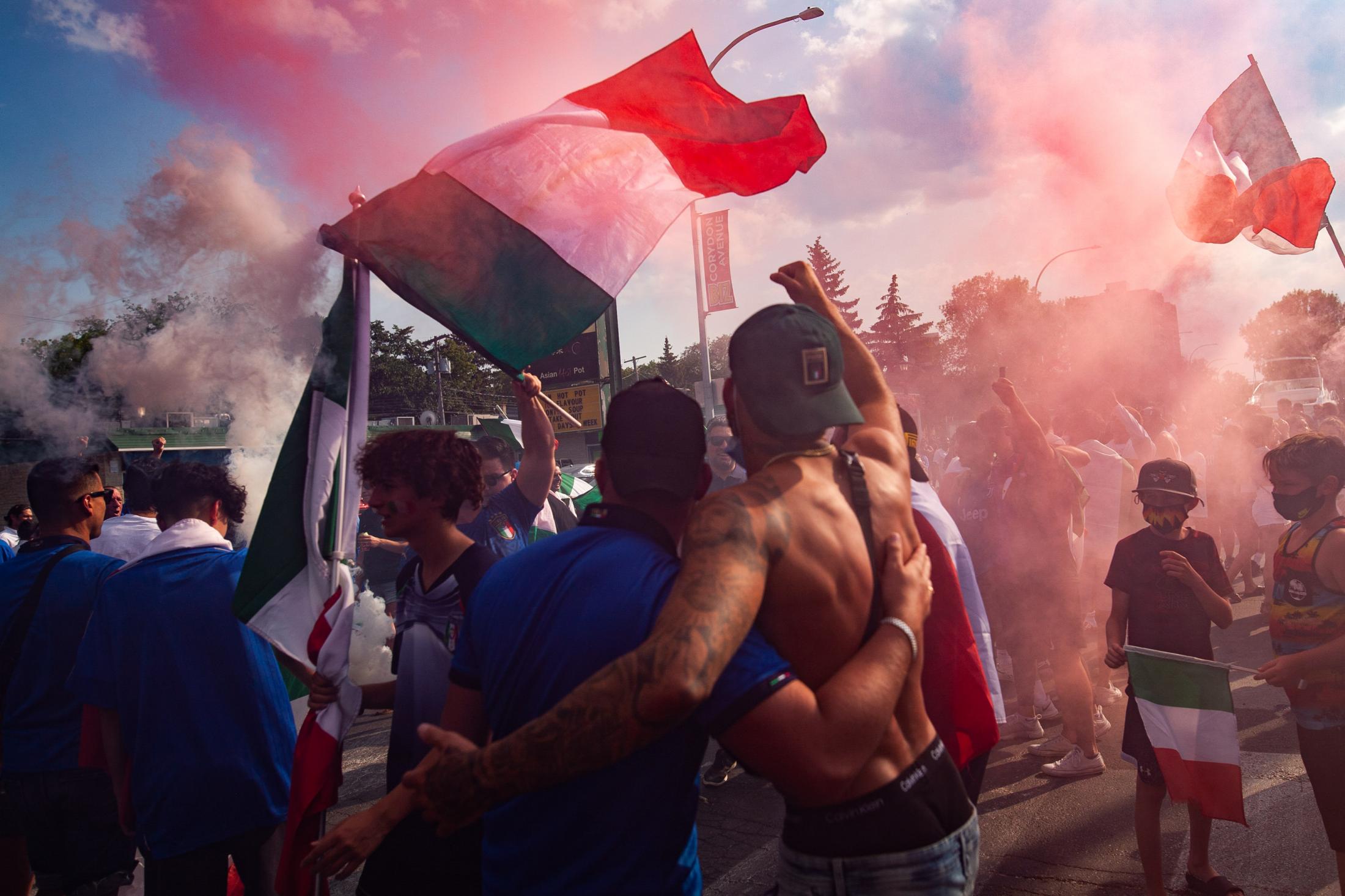 Singles - Fans of the Italian national soccer team spill onto...