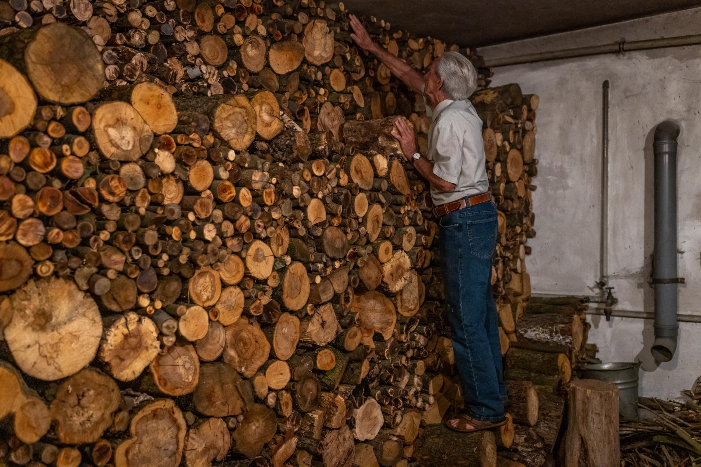 HEAT PUMPS- for The Washington Post - Andrzej K. 83, stores wood to help combat the coal and...