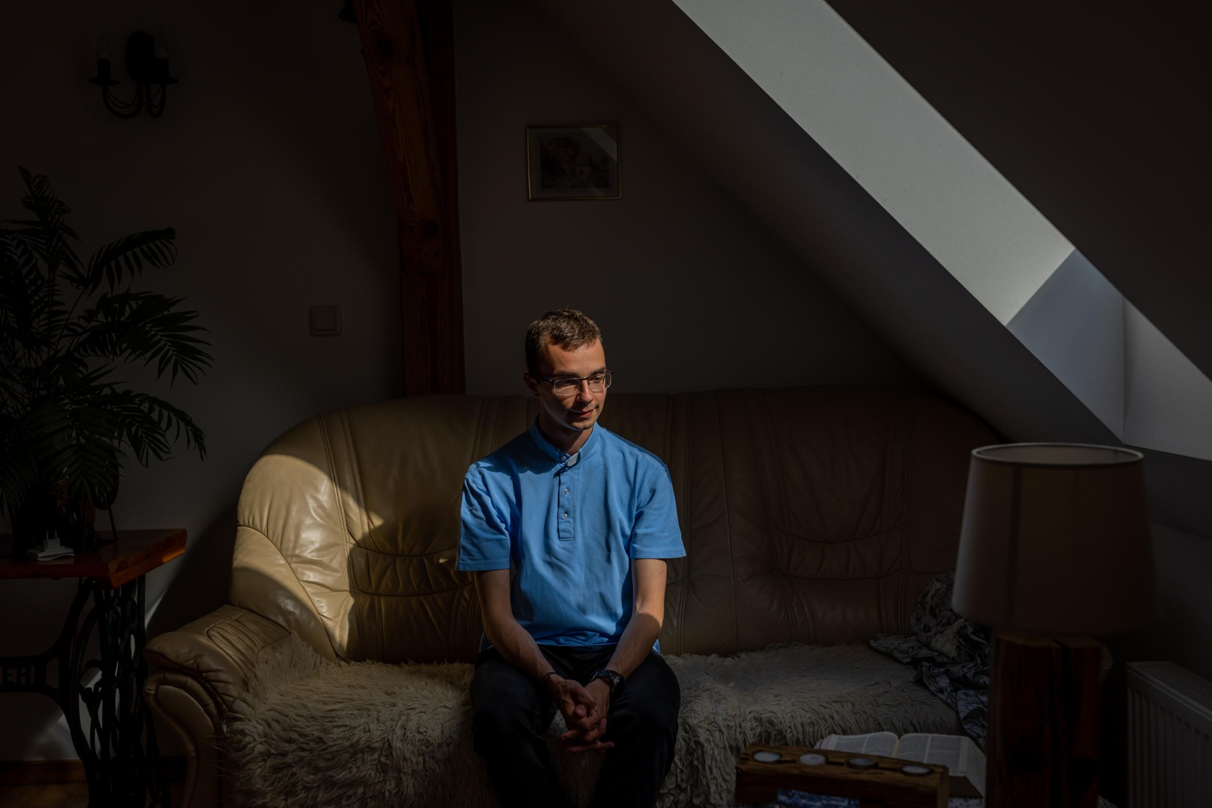 LONELY POLISH PRIEST -for NRC - Cleric Krzysztof Dzikowski in his family home during the...
