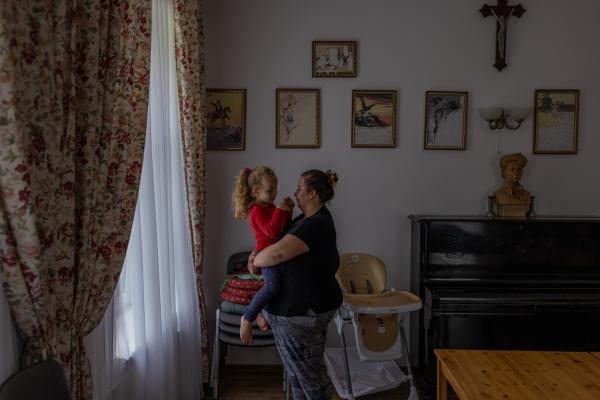 Image from "MY LIFE IS IN DANGER" - for NYTimes - Kasia, a victim of domestic abuse, with her daughter. She...