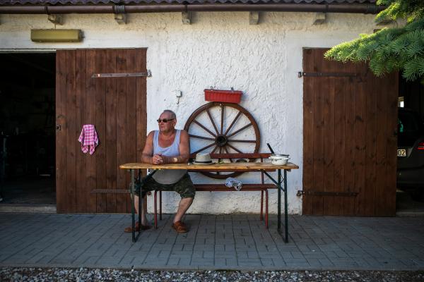 Image from I THINK ABOUT IT EVERY DAY -  Jan in his backyard, in village border with Russian...