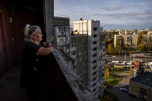 Image from OVER THE BORDER - Zinaida Polosina (61), looks at view of Kyiv from the...