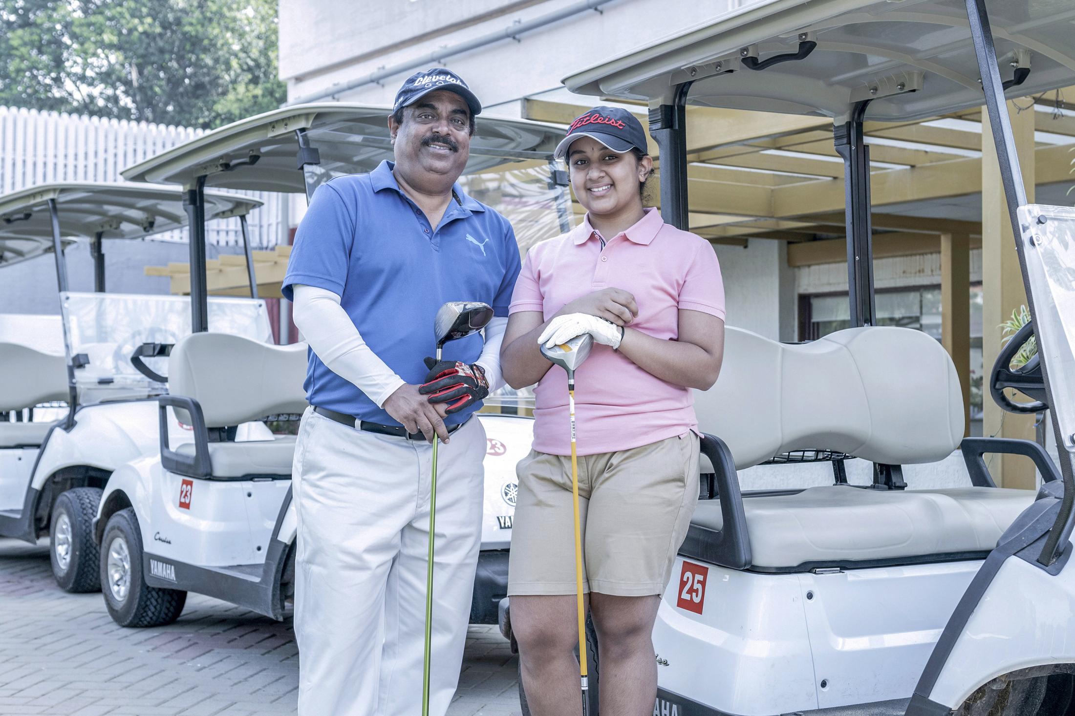 City Of Techies - Ranga and his daughter pose with Golf Clubs. Ranga who...