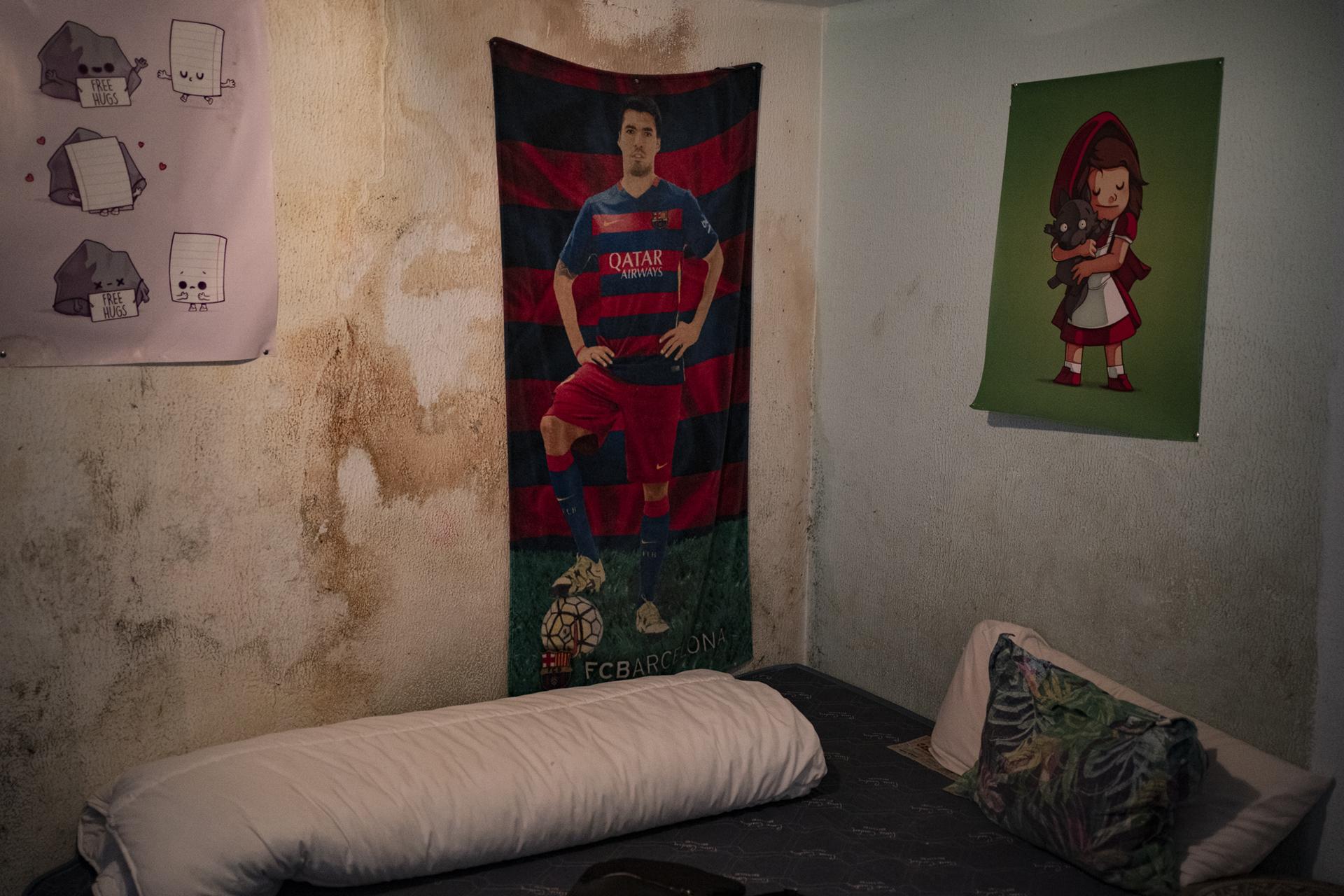 Barcelona Housing Crisis (ongoing) -  Soccer player Luis SuaÌrez poster is seen in the...
