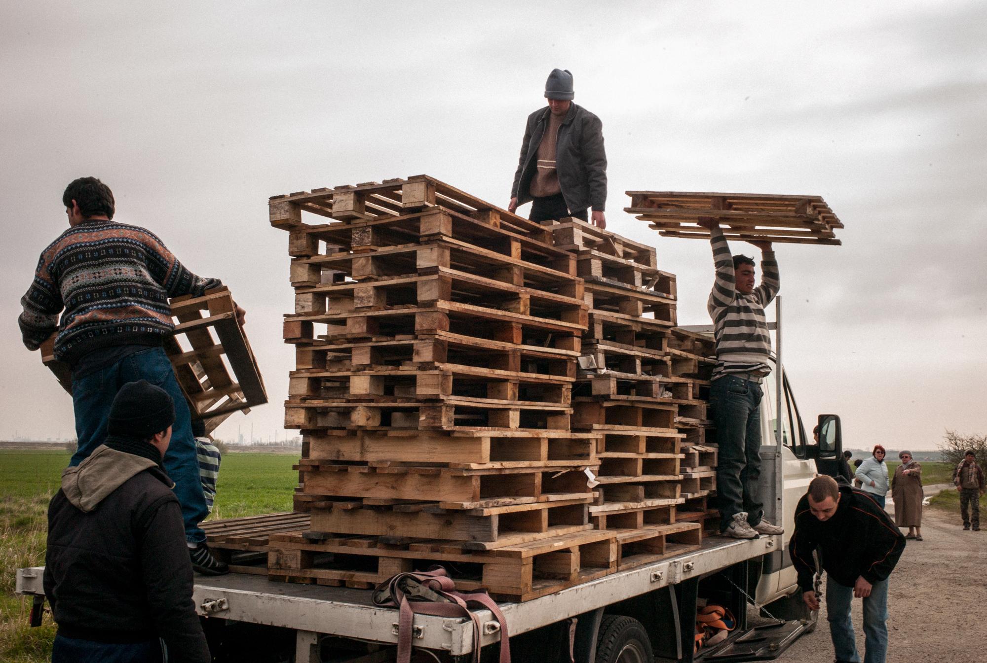 Kurdish and Afghan immigrants receive weekly wood supply from Emmaus, the French national charity...