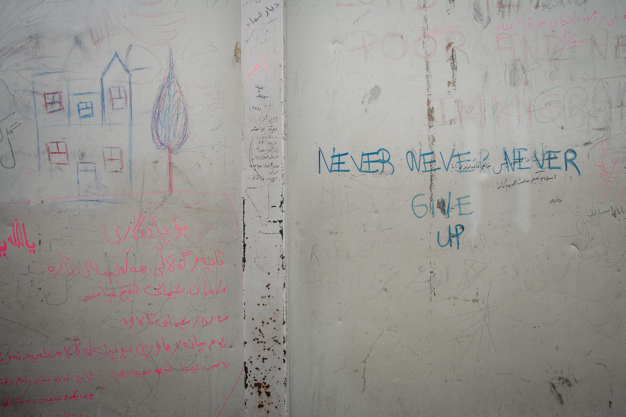 Migrants in Calais, France (2008) - Back of the canteen used by La Belle Etoile to serve...