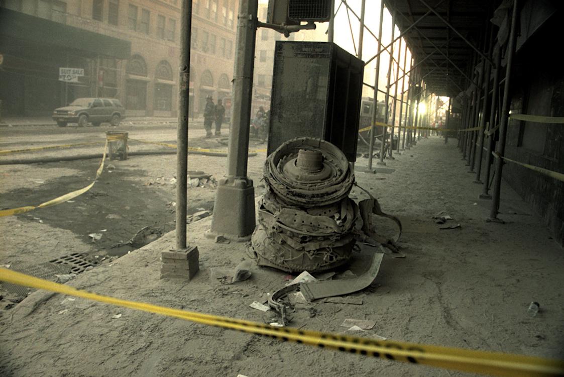 Remains of a jet engine that landed on a sidewalk near the World Trade Center. New York City....