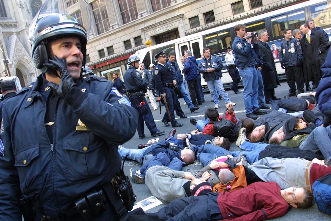 911 Anti-War Protests - Anti-war demonstrators stage a "die-in" outside...