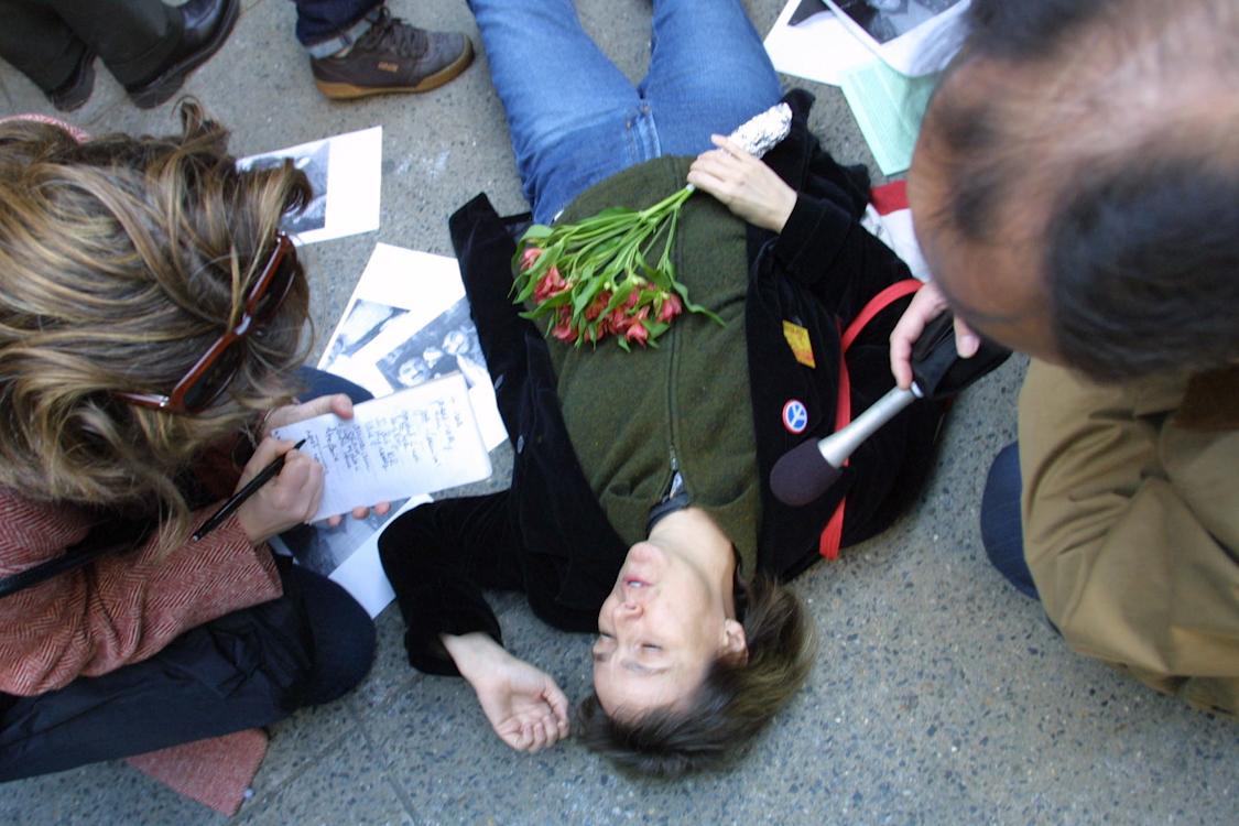 911 Anti-War Protests - Anti-war demonstrators stage a "die-in" outside...