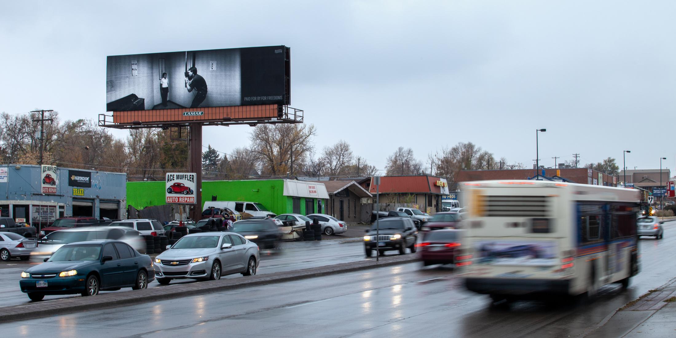For Freedoms billboard installed on Federal Blvd in Denver, Colorado. Image courtesy Jeff Scroggins.