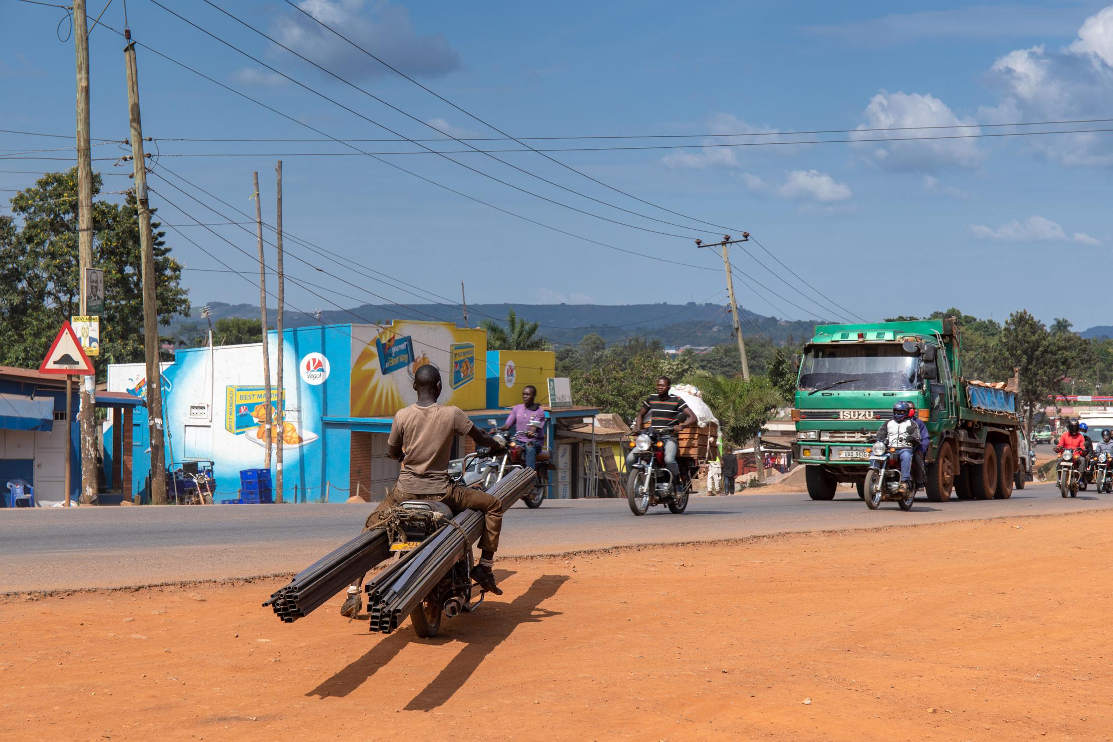 Domestic Express - Frank a delivery man rides off to deliver a clients consignment of iron bars, he says he can...