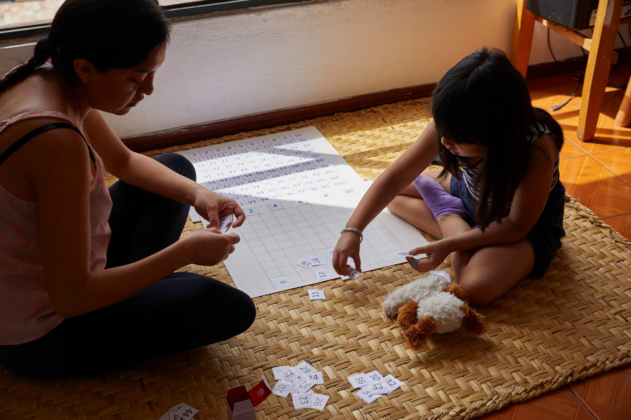 Sofia Armas and her daughter Samay Ald&aacute;s, review the number sequence. Sofia is an...