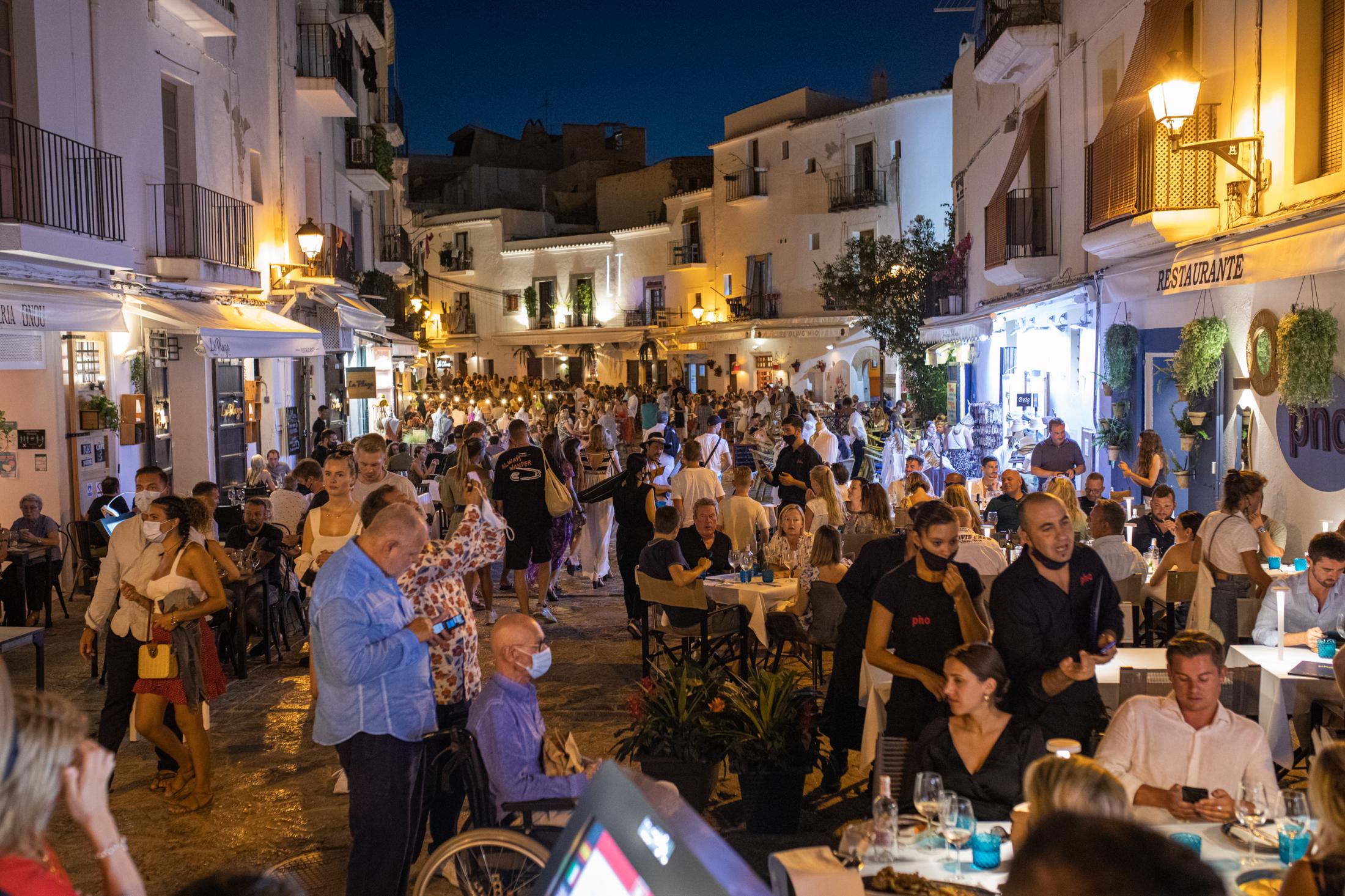 Covid-19: Ibiza Parties Infiltrated By Detectives - IBIZA, SPAIN - AUGUST 6: Crowds in the narrowest and most...