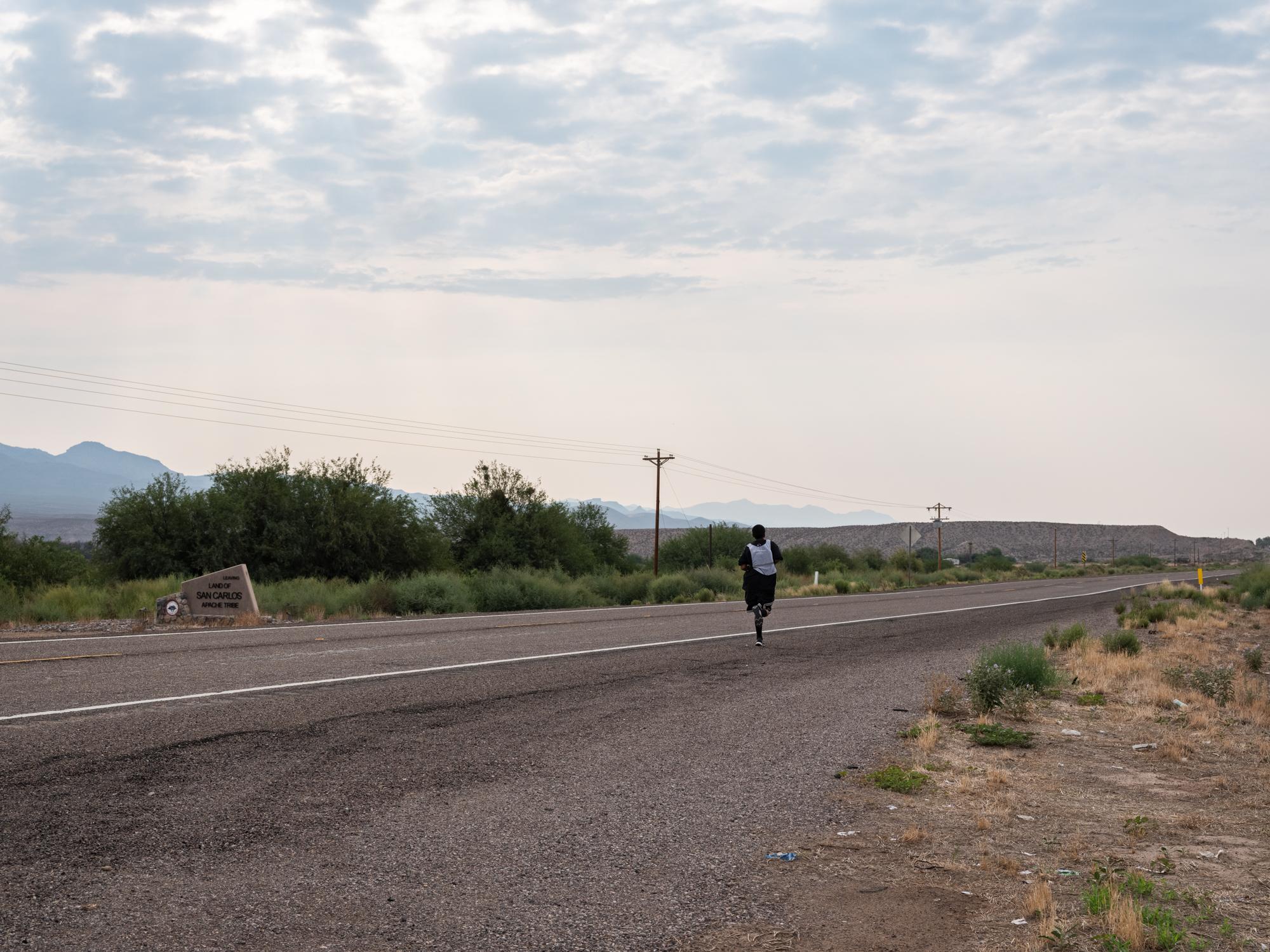 30 Years Running - High Country News - Thomas Nosie Jr. crosses the San Carlos Apache...