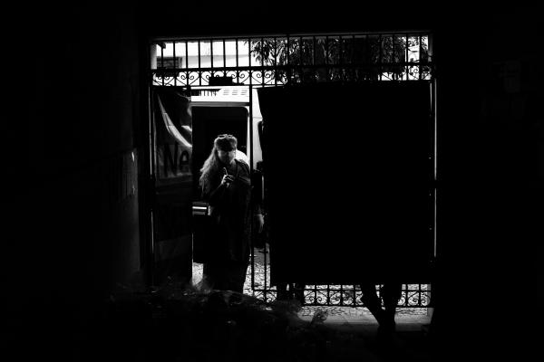 Rio's trans sex workers during COVID - Activist Indianare Siqueira is seen using a protection mask in the front gate of Casa Nem (Nem...