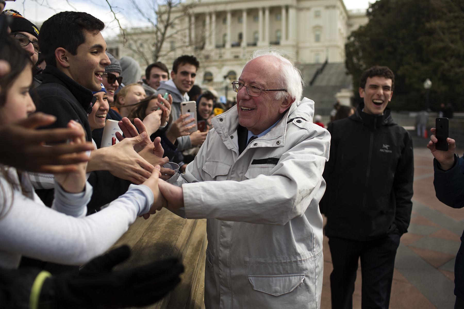 Politics - Senator Bernie Sanders shakes hands with students on the...