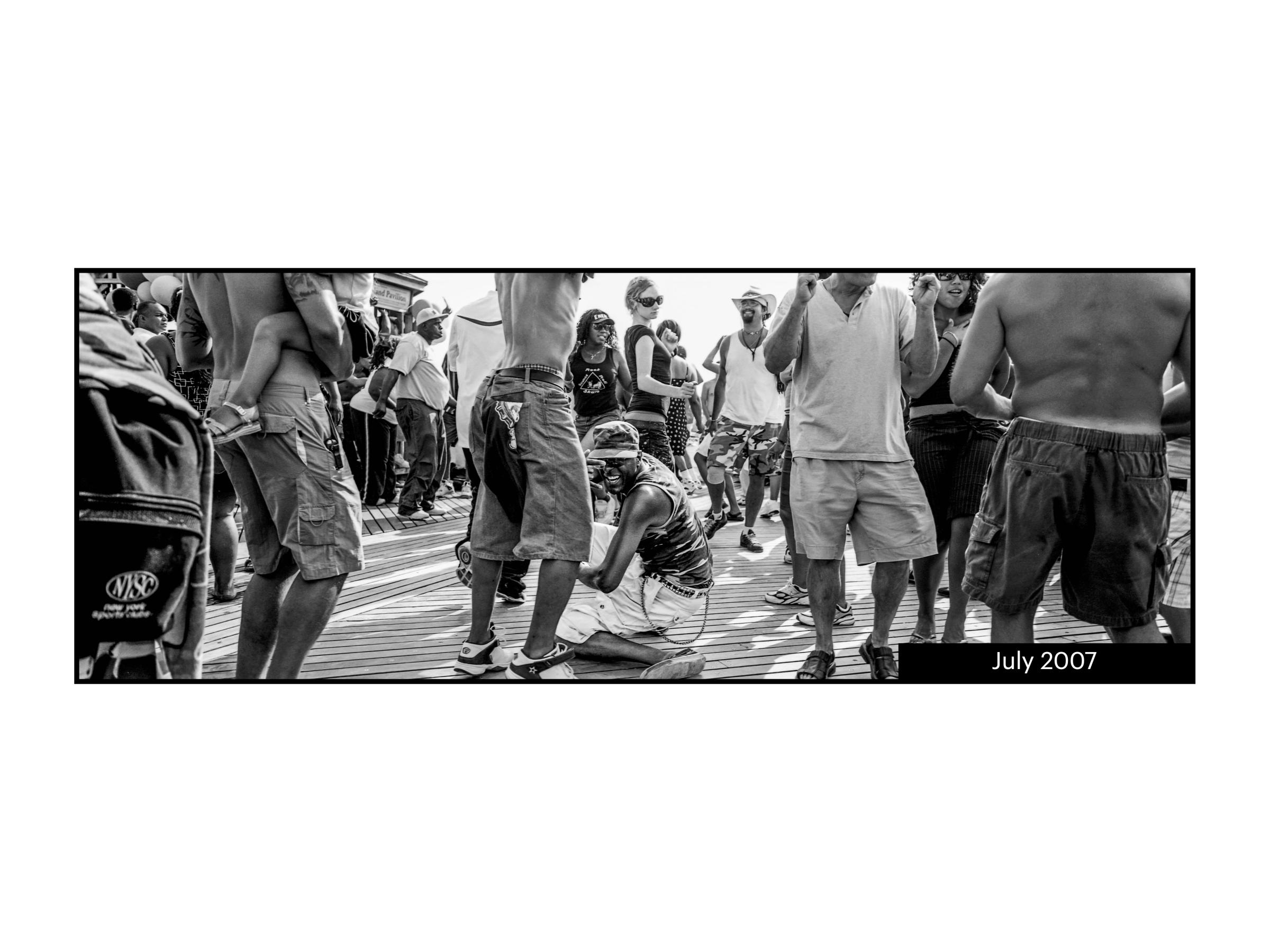Coney Island House - Waist-level panoramic perspective of dancers on the dance...