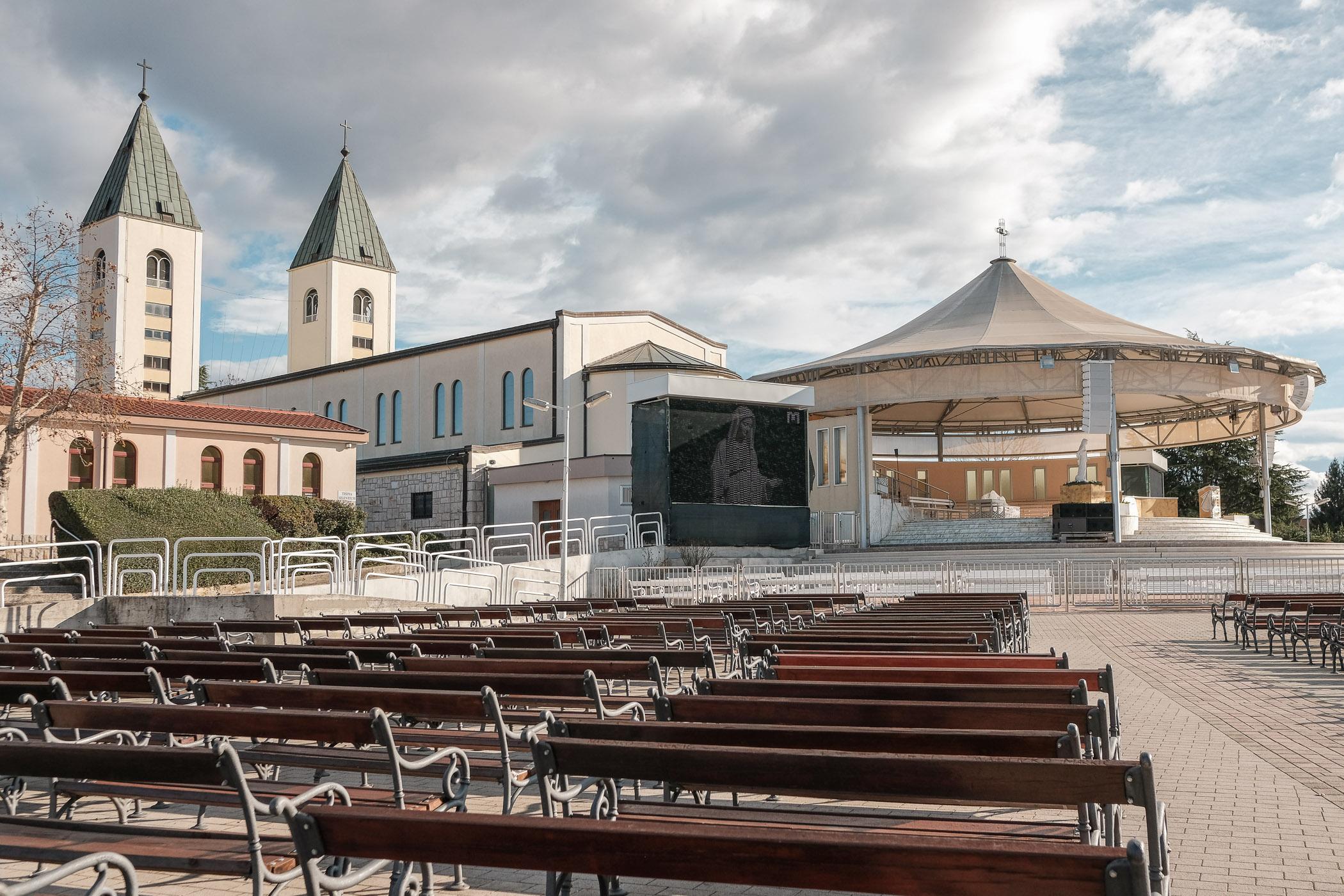 Empty seats in the overflow section of the Church of Saint James, Medjugorje, Bosnia and...
