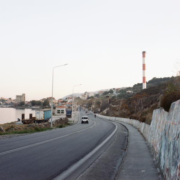 Image from In the Name of God -   The road from the refugee camp to the city center takes...