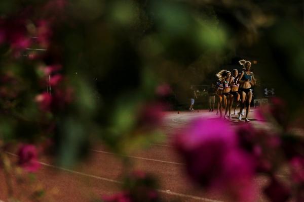 AZUSA, CALIFORNIA - JULY 25: Runners compete in the women&#39;s 5000 meter run during the Under Armour Sunset Tour on July 25, 2021 in Azusa, California. (Photo by Katharine Lotze/Getty Images)