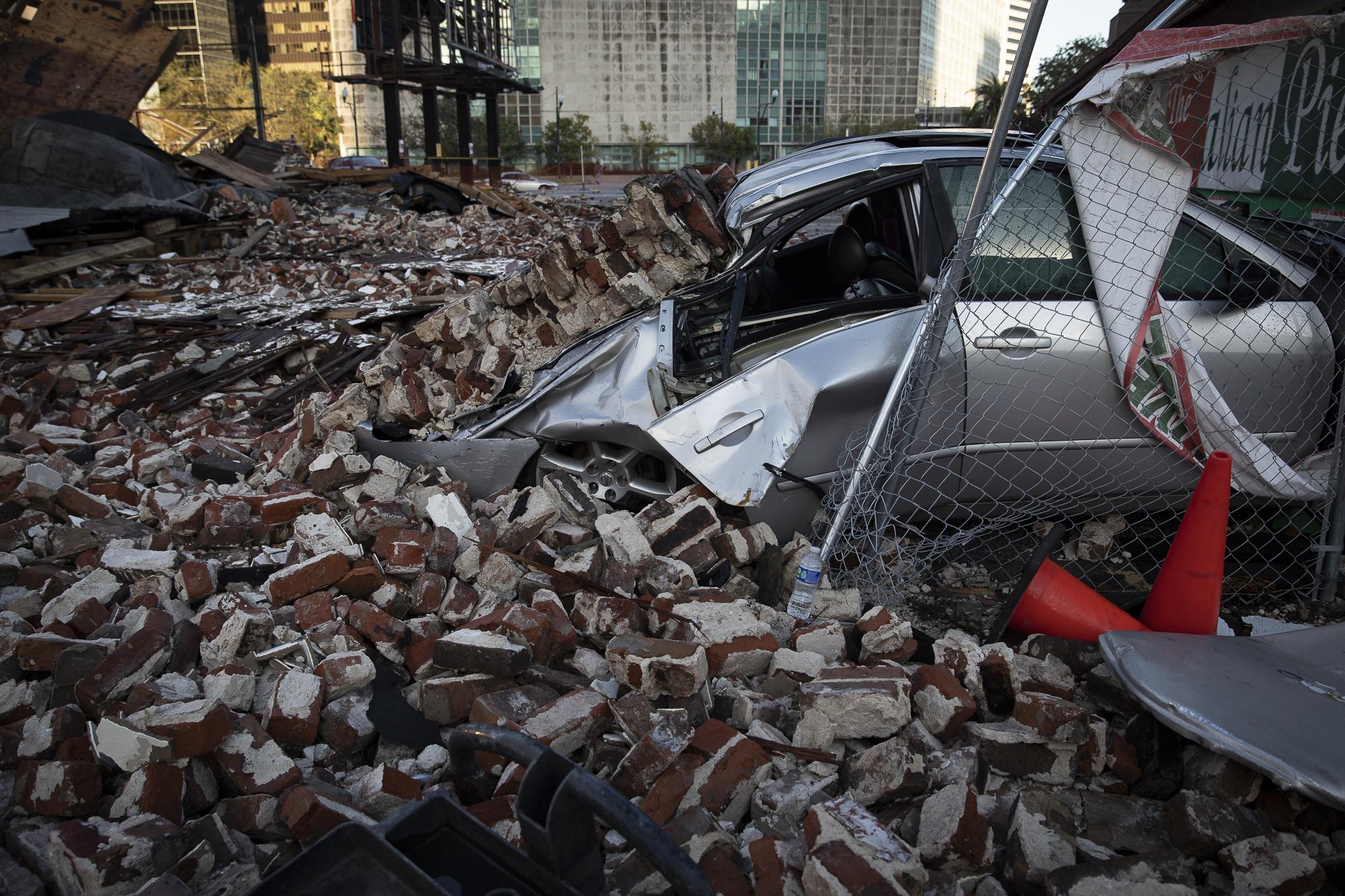 Hurricane Ida in Louisiana - A destroyed car is seen under a building debris after...